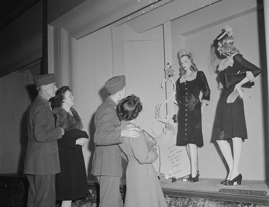 Soldiers and their girls window shopping. April, 1943.